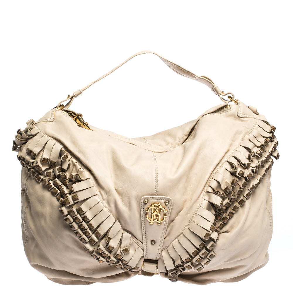 Shop Roberto Cavalli Cream Leather Studded Fringe Hobo In Beige