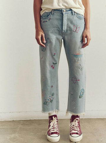 THE GREAT. embroidered wayne jean in kentucky wash