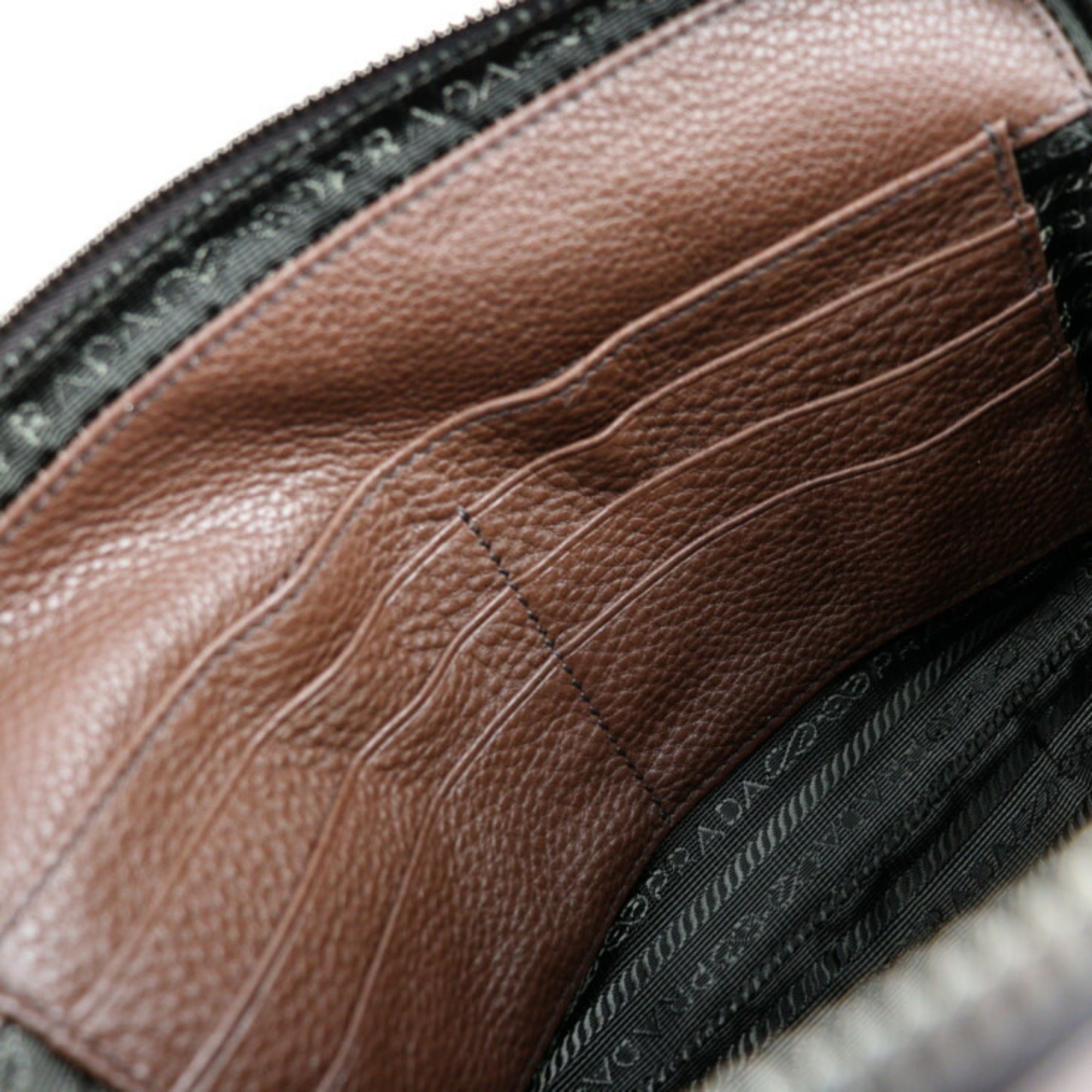 Shop Prada Leather Clutch Bag () In Brown