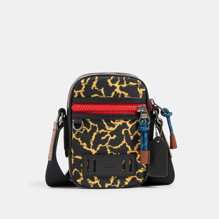 terrain crossbody with wavy animal print