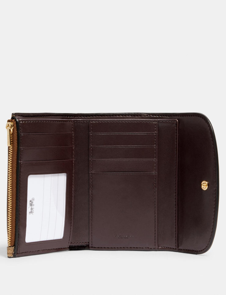 remi medium envelope wallet in colorblock signature canvas