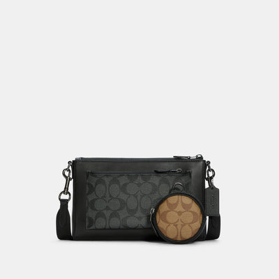 Coach Outlet Corner Zip Wristlet In Signature Canvas