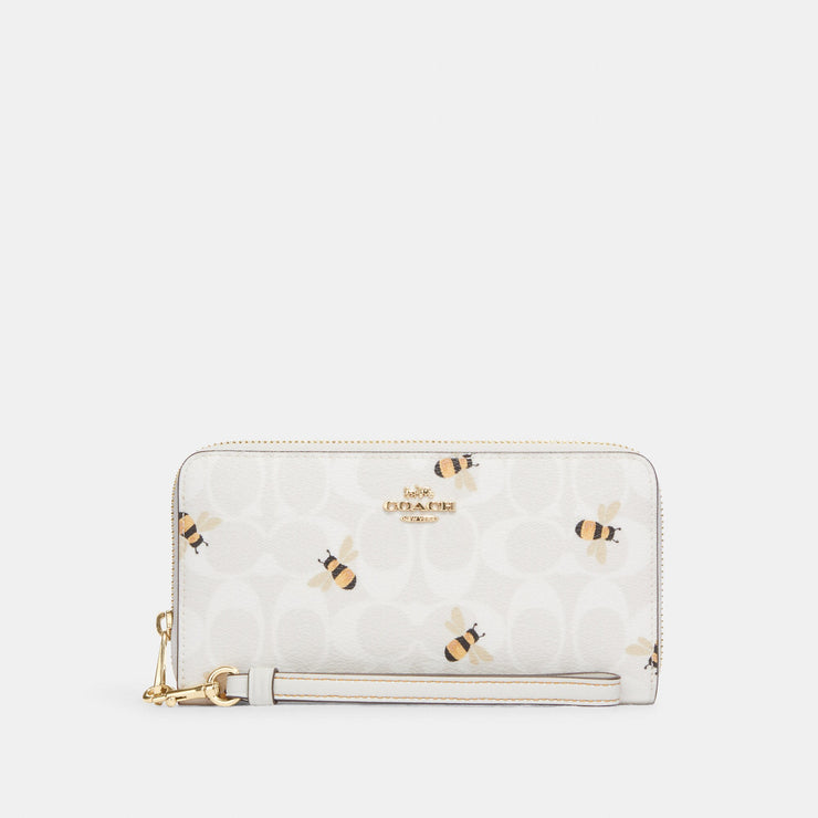 Coach Outlet Long Zip Around Wallet In Signature Canvas With Bee Print |  Shop Premium Outlets