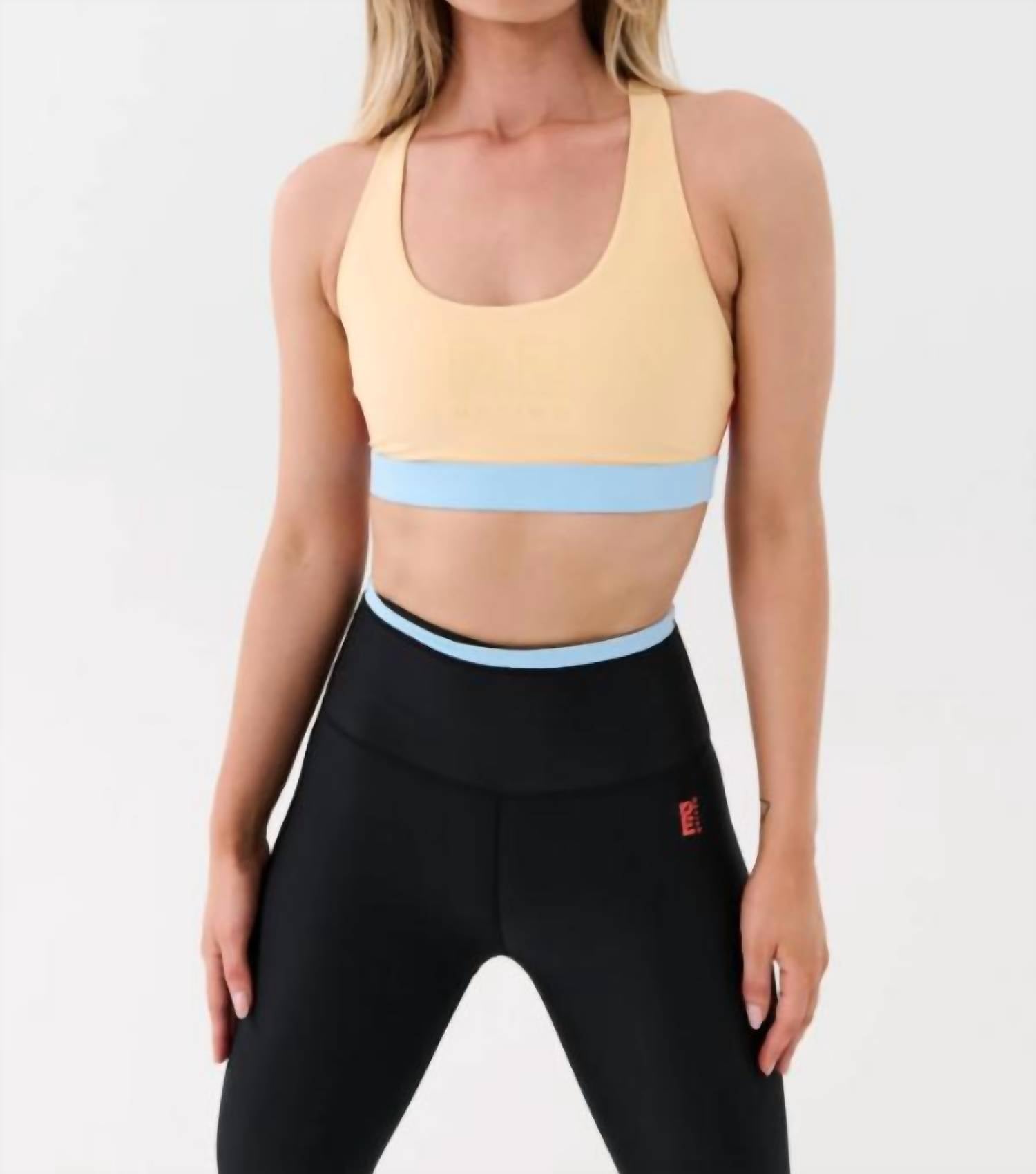 P.E NATION Denizen Sports Bra in Apricot Sherbet