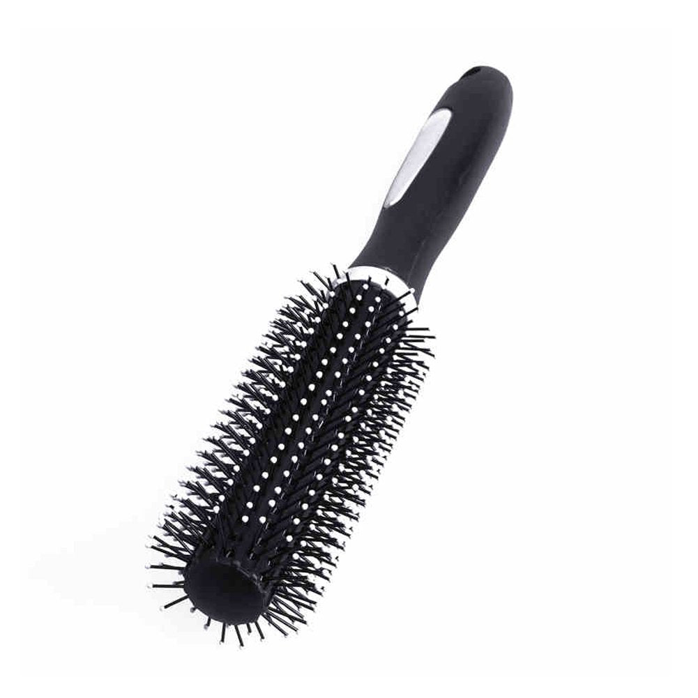 A round brush and round comb used by hairstylists