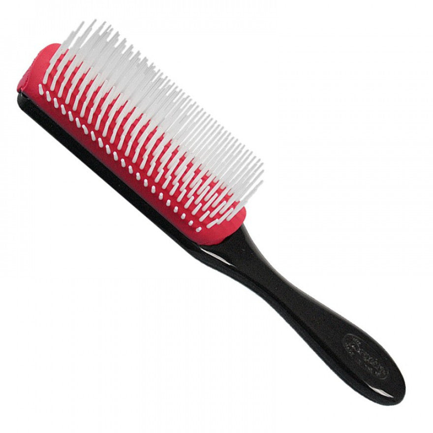 The denman brush and comb used in hairdressing