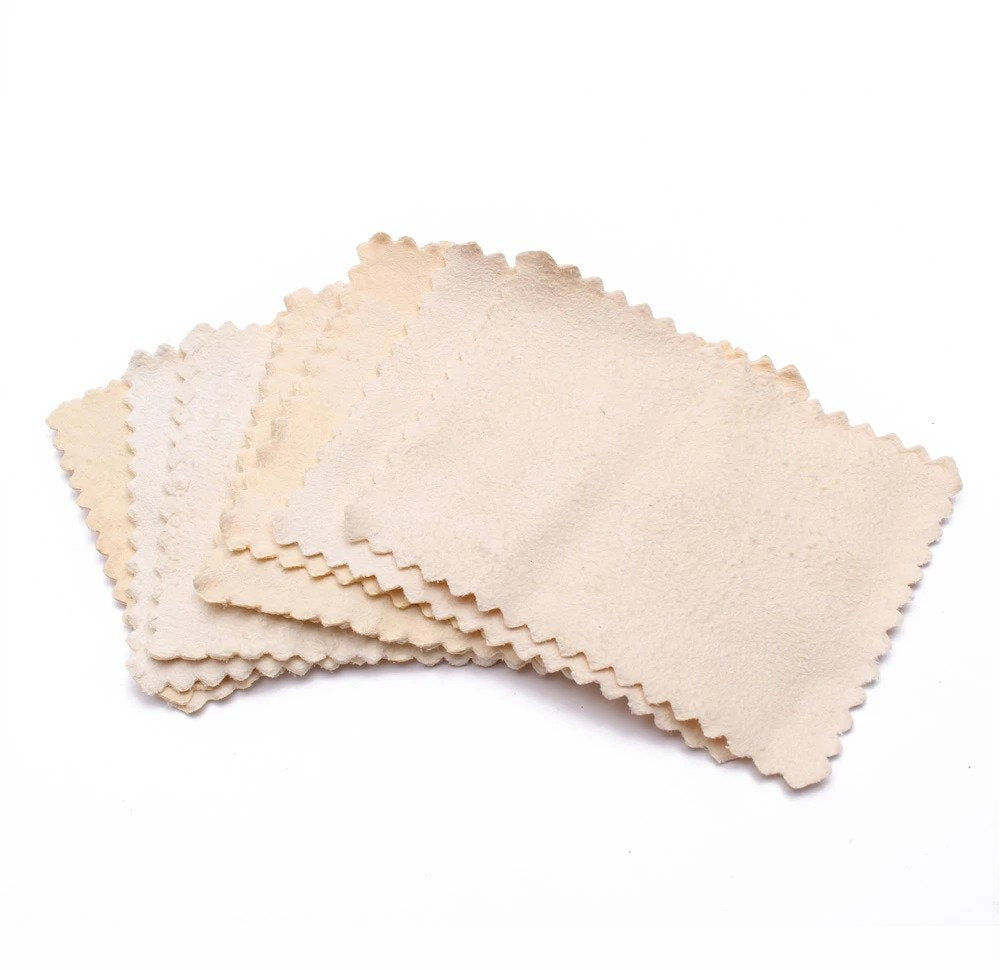 The cleaning cloth for hairdressing shear blades with dirt, grim, buildup and more