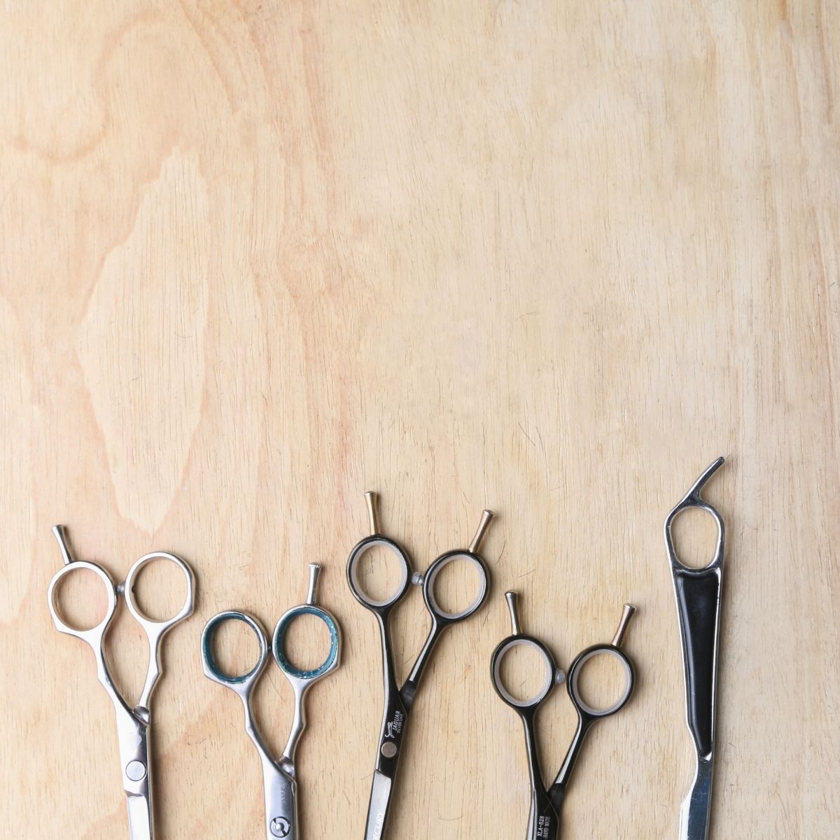 Different American hairdressing shears with hooks (tang) on the handles