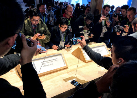 Attendees at the CES crowd Sony's booth to get their hands on some new tech.