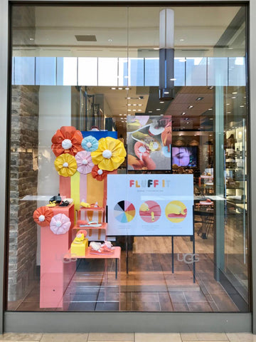 Colorful pedestals in Ugg Toronto window display. Window displays do more than just showcase your products. They engage your customer and convert sales.