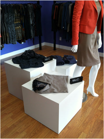 White laminate cube tables for retail display