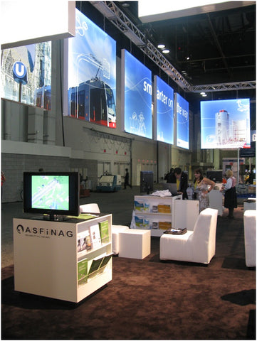 White laminate cube tables in trade show booth
