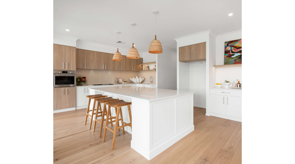 3 Pendant Lights hanging above a kitchen island bench