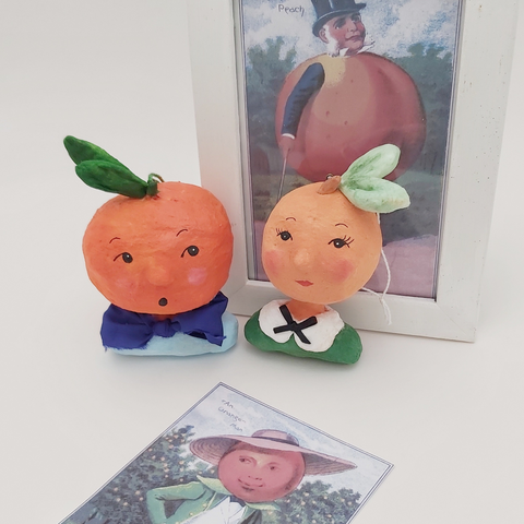 spun cotton anthropomorphic orange and peach ornaments