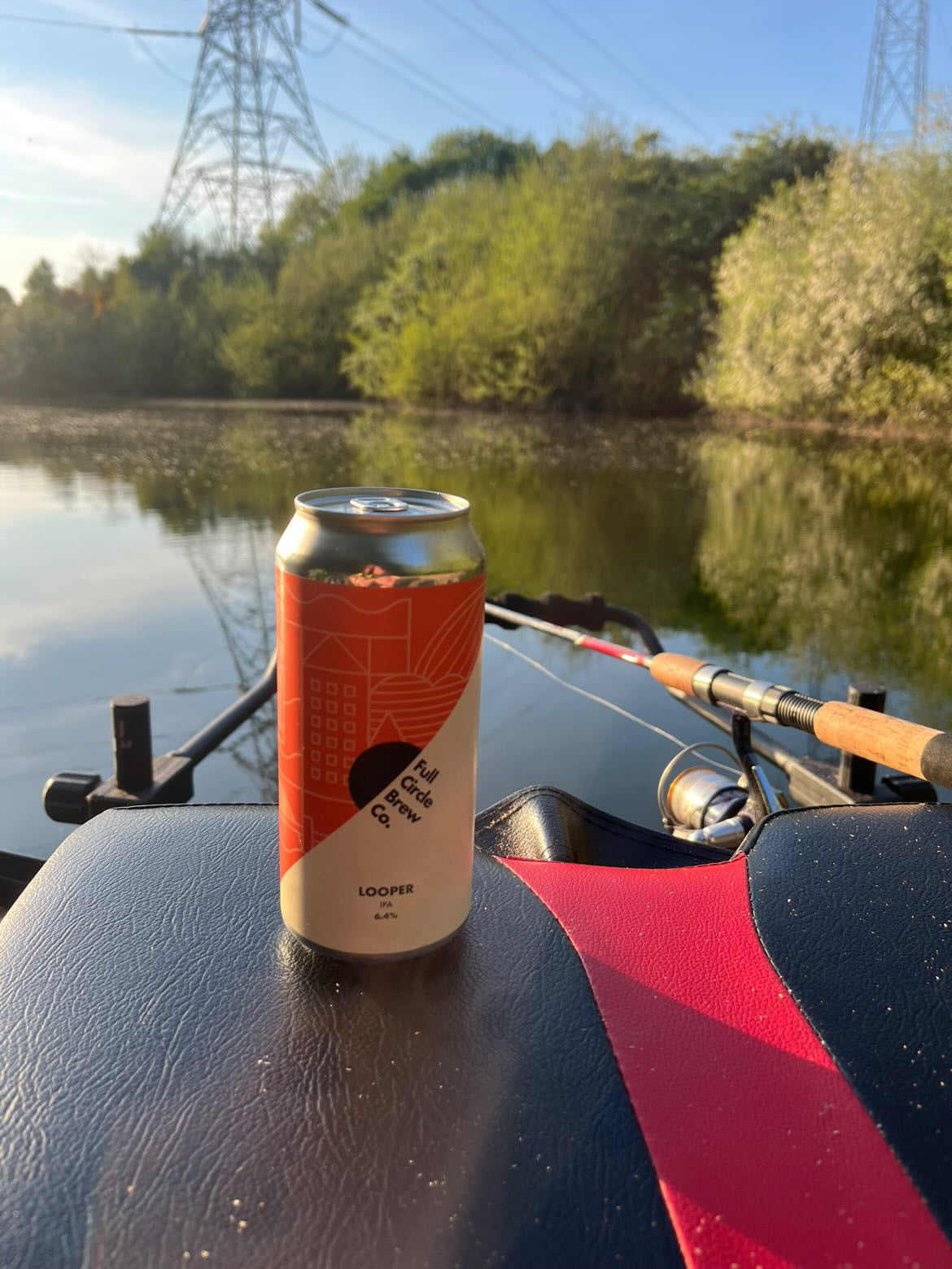 a can of full circle beer looper on the top of a boat