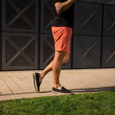 men wearing shorts and black espadrille shoes