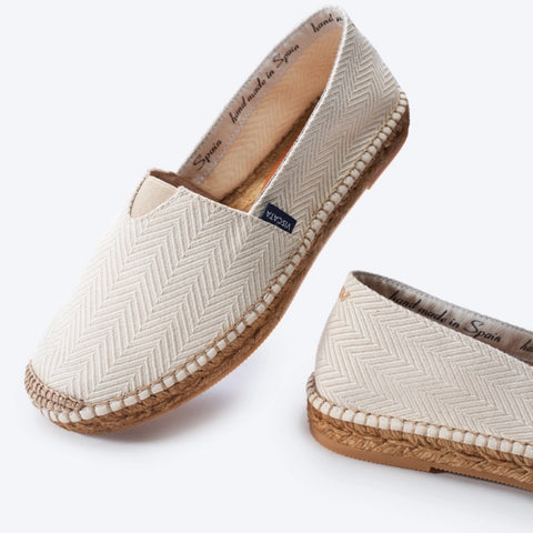 Beige recycled PES espadrille flats. Handmade in Spain.