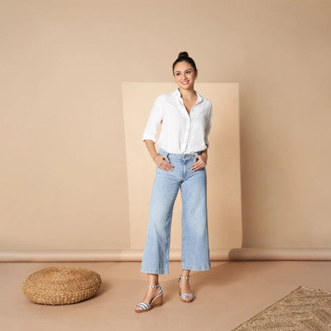 woman wearing jeans and white shirt and sailor stripes espadrille wedges