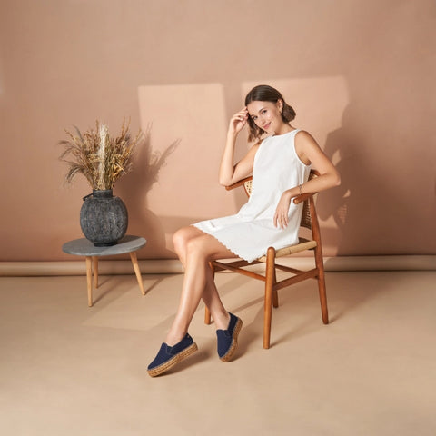 woman wearing navy espadrilles