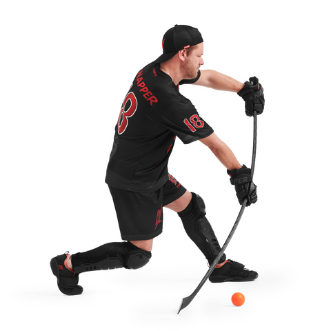 Ball Hockey Player Showing The Flex Level of a Stick