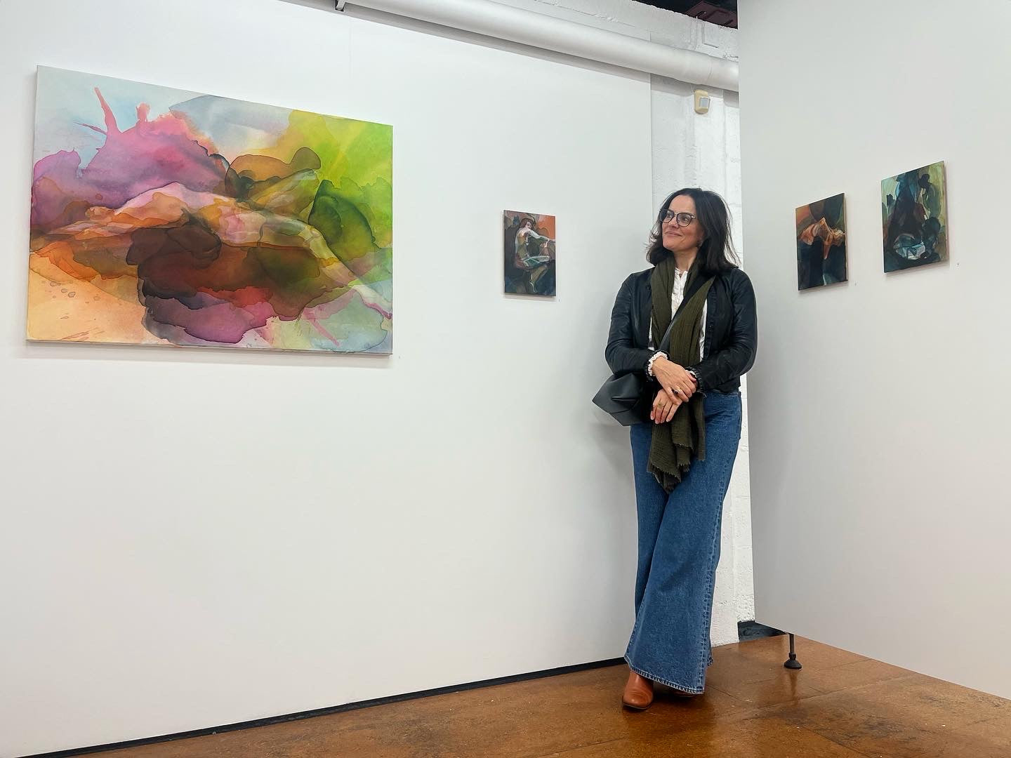 Amanda Billing standing with Lyra, Eldfell, Jökla, and Thrinu for group show Aquarelle August 2023