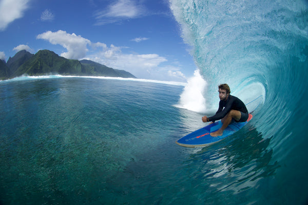 Benoit Carpentier SUP surfing into a surf tube