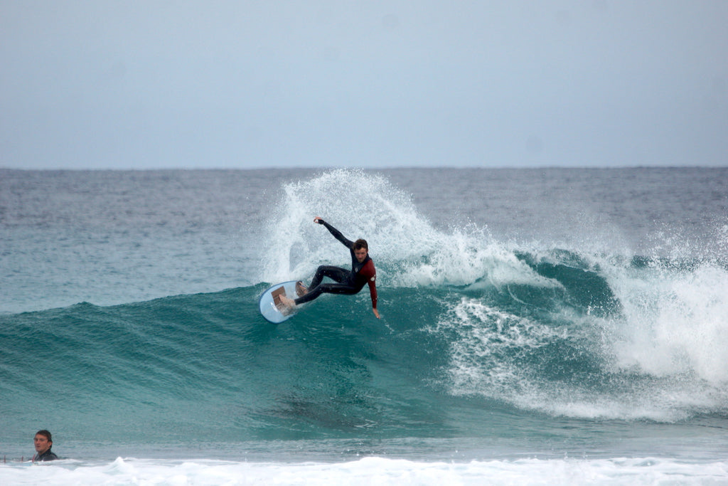 Benoit Carpentier from RSPro team carving a turn on a fish surfboard