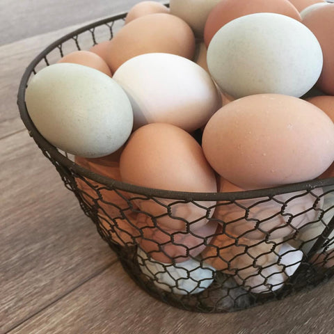 basket of fresh BatCrow Farms pasture raised chicken eggs