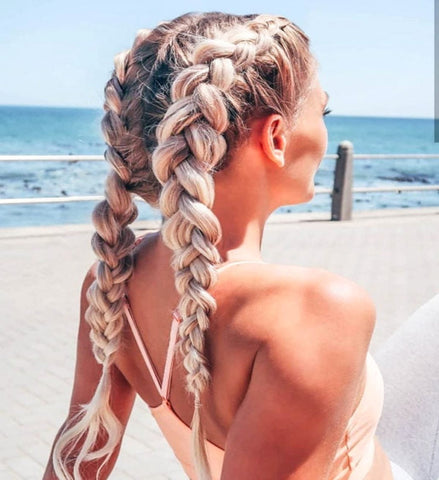 Blonde Woman With Two Dutch Braids