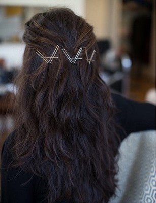 Brunette with Bubby Pins in V shape Around Crown of Head