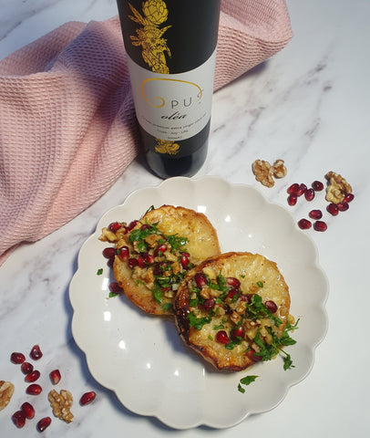 celeriac steaks with a walnut pomegranate topping