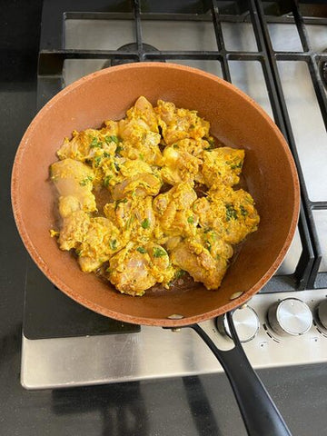 marinaded chicken tikka in pan