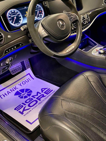 Close up image of clean interior of a luxury car to convey interior car detailing - sigma kore