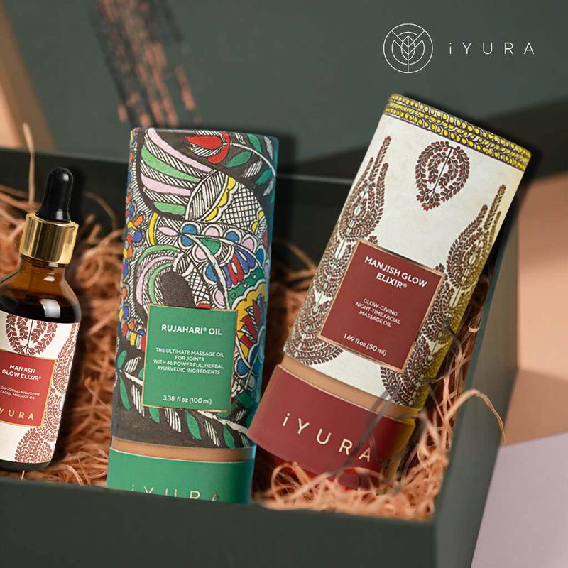 Manjish Glow Elixir and other iYURA products showing off their beautiful packaging with Madhubani painting