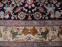Load image into Gallery viewer, Qum pure silk rug - collectors item Classic vintage silk rugs Origin: Qum Design: Floral with medaillon Colors: indigo blue, gold, red, green Pile hand-knotted 100% pure natural mulberry silk Size: small rugs - also for wall decoration Age: Approx. 1970/80 Condition: Very good, side edges and fringes rstored, freshly washed  Knot density: 600 kpsi