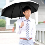 Men use special umbrellas to protect from UVA rays