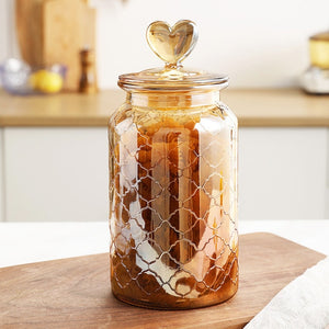 large heart shaped glass jar with cork