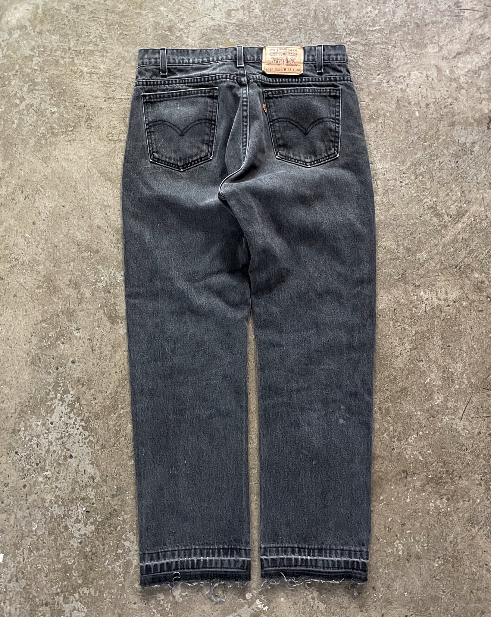 LEVI'S 505 FADED BLACK RELEASED HEM JEANS - 1980S