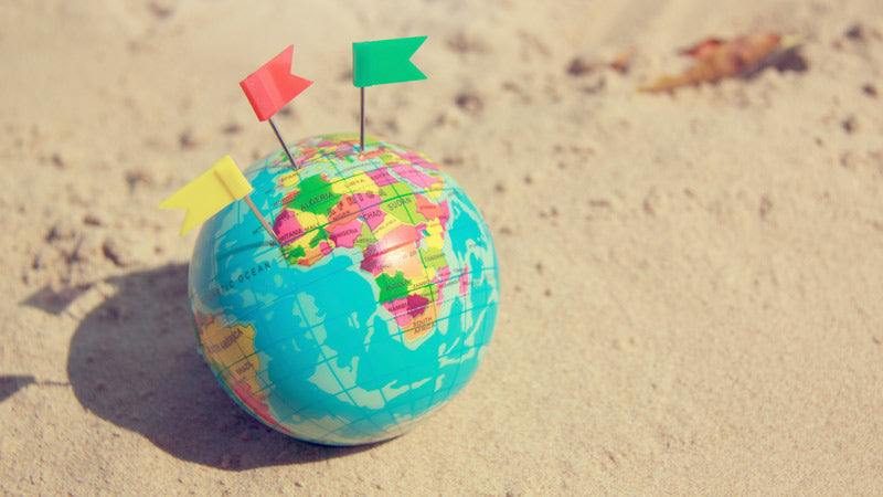 Globe on sand