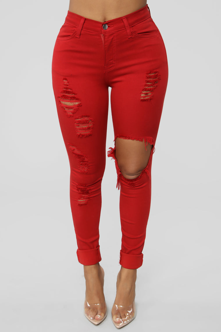 red distressed jeans