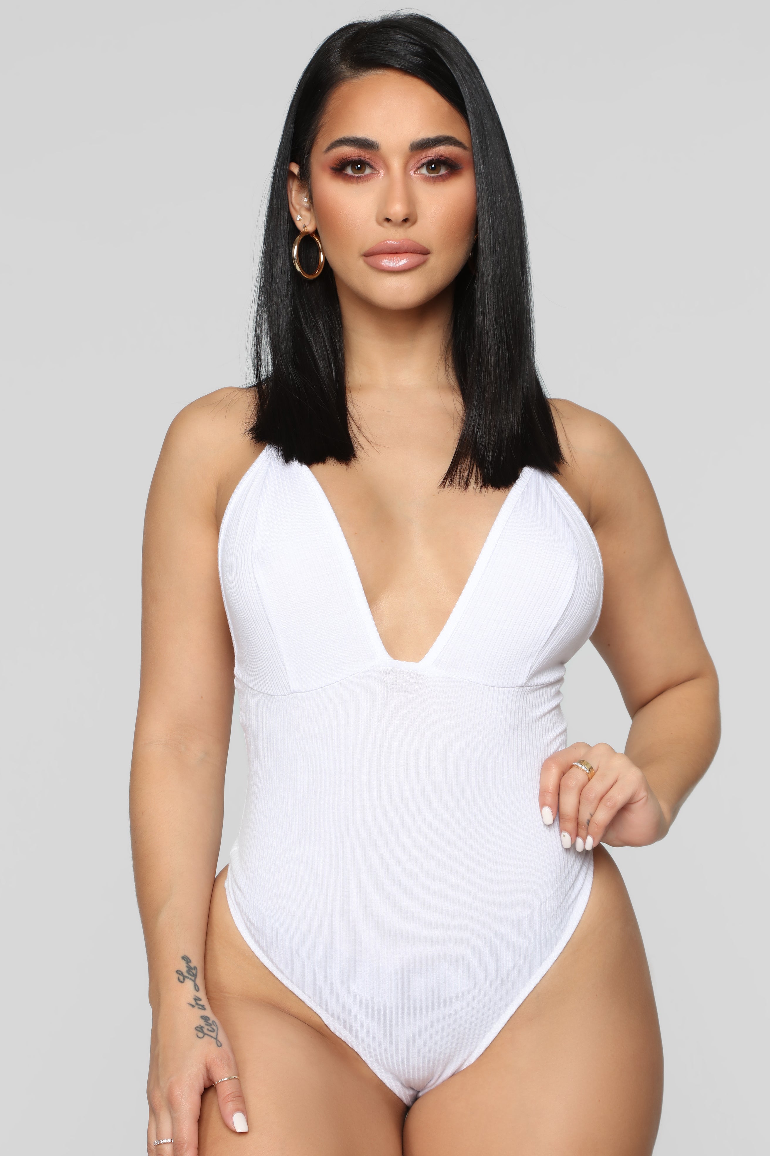 white strappy bodysuit