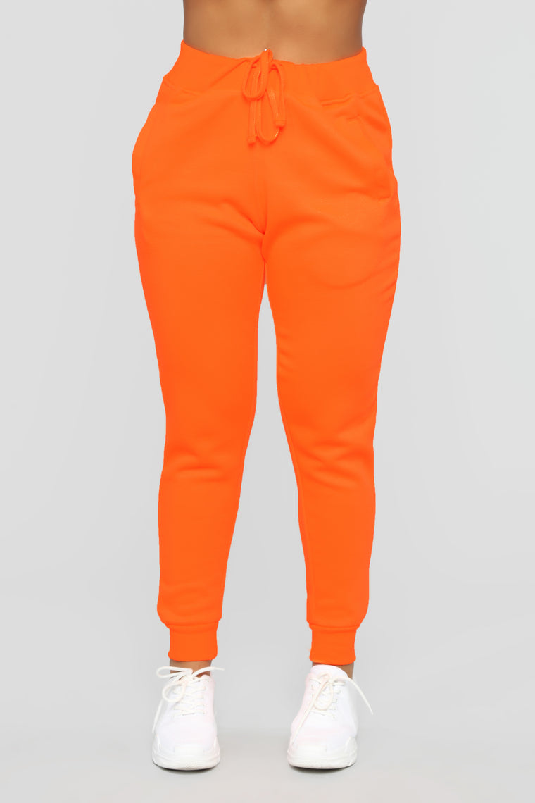 neon orange joggers