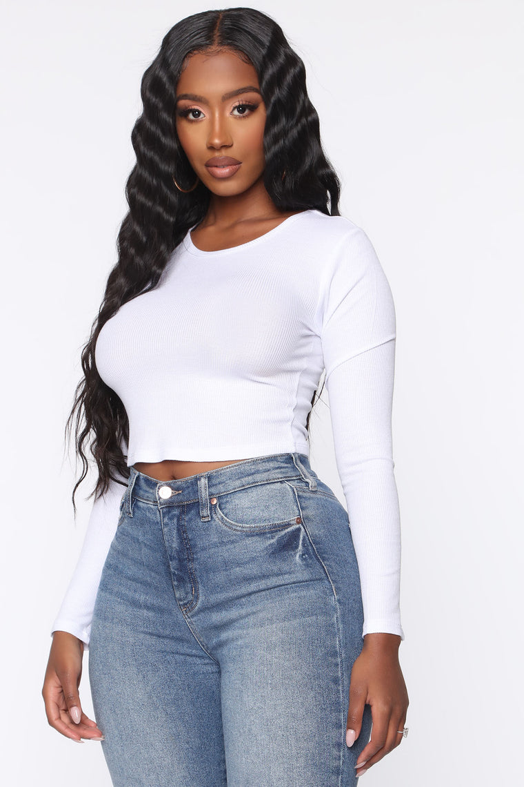 long sleeve crop top and jeans