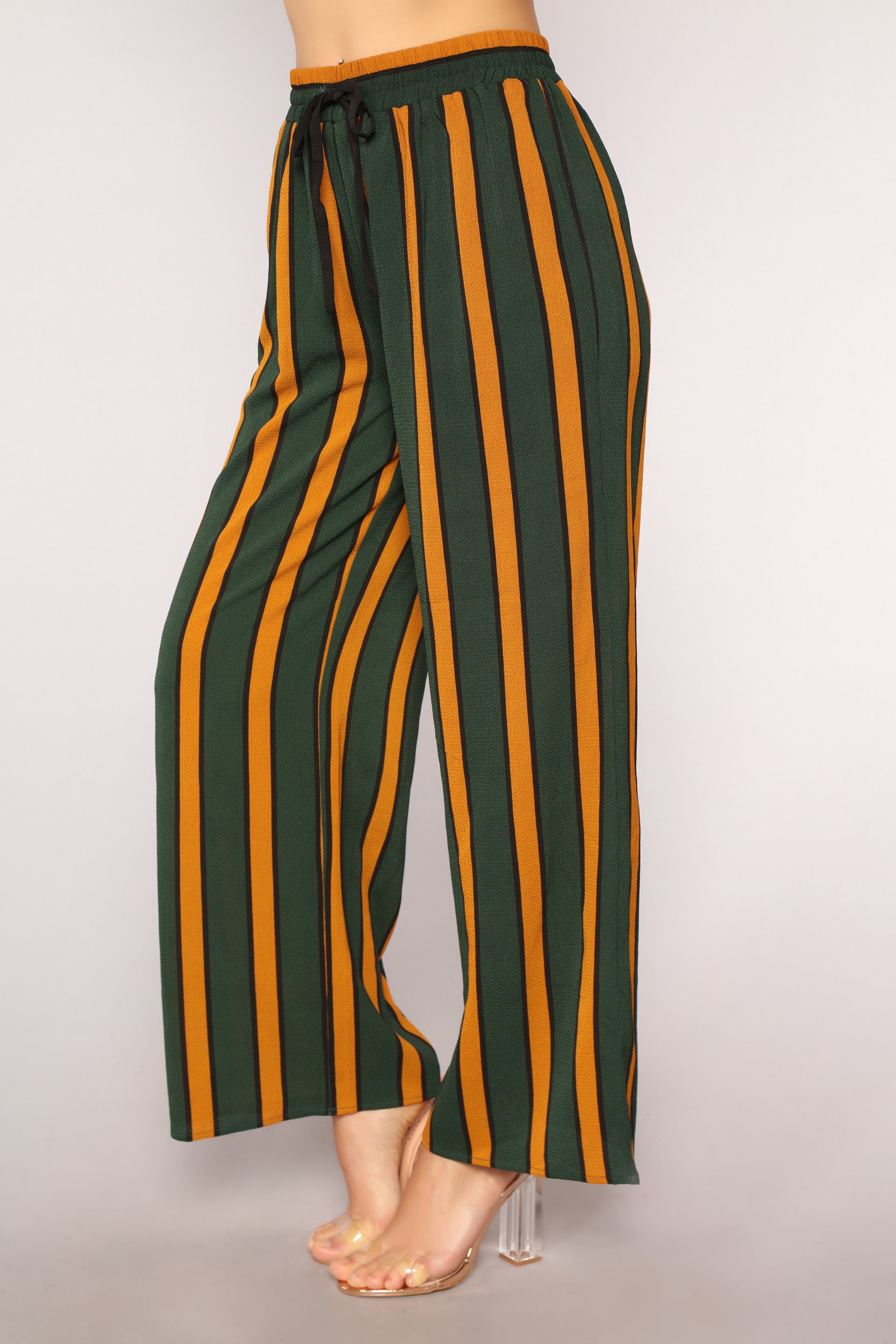 green and yellow striped pants