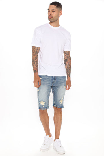 white distressed jean shorts mens