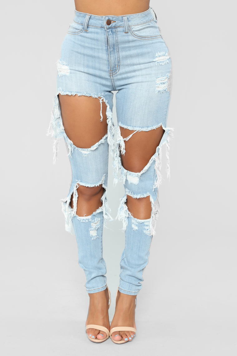 light blue torn jeans