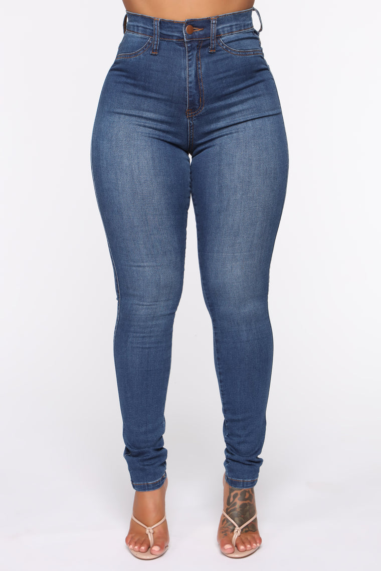 high rise dark blue jeans