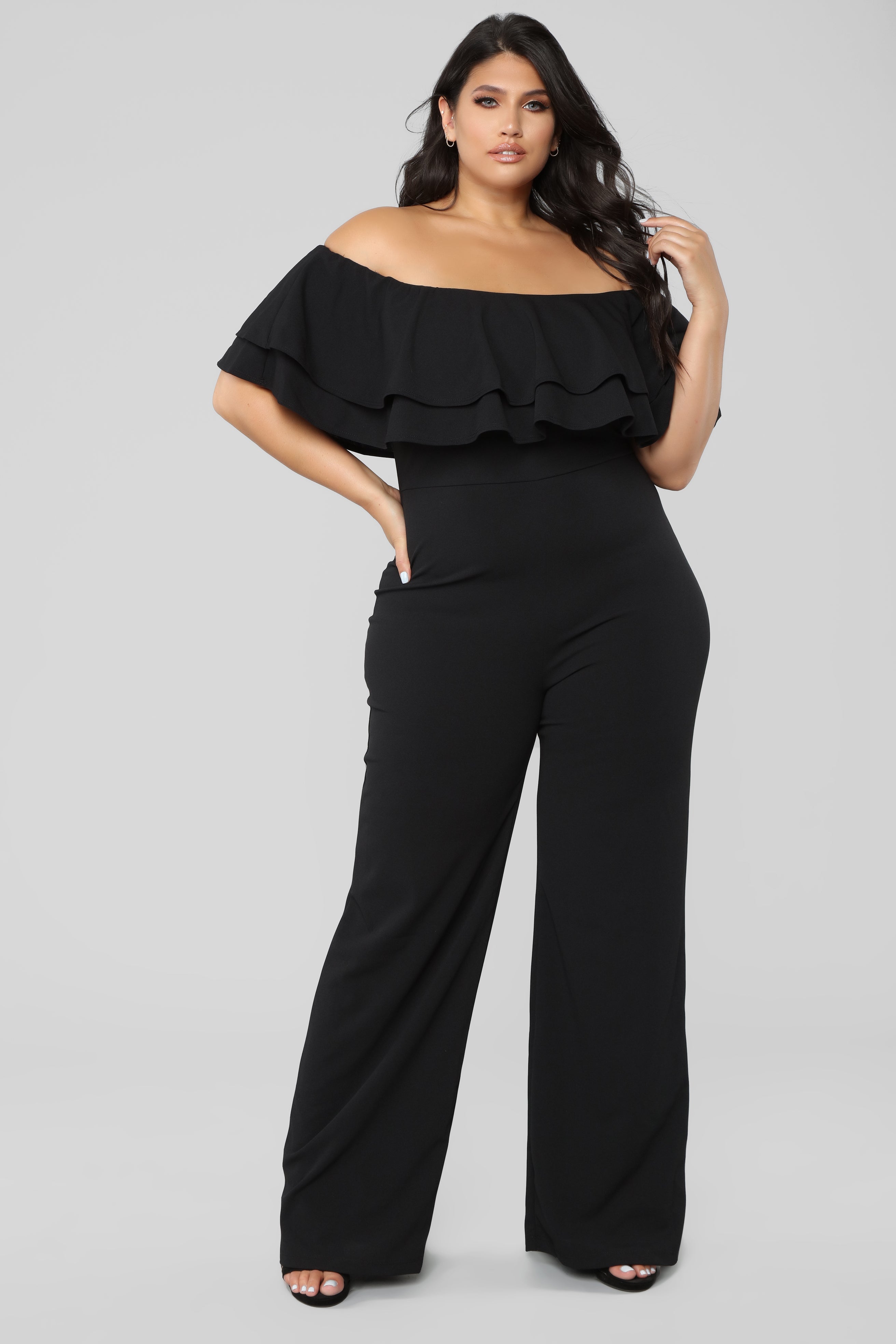 black jumpsuit with ruffles