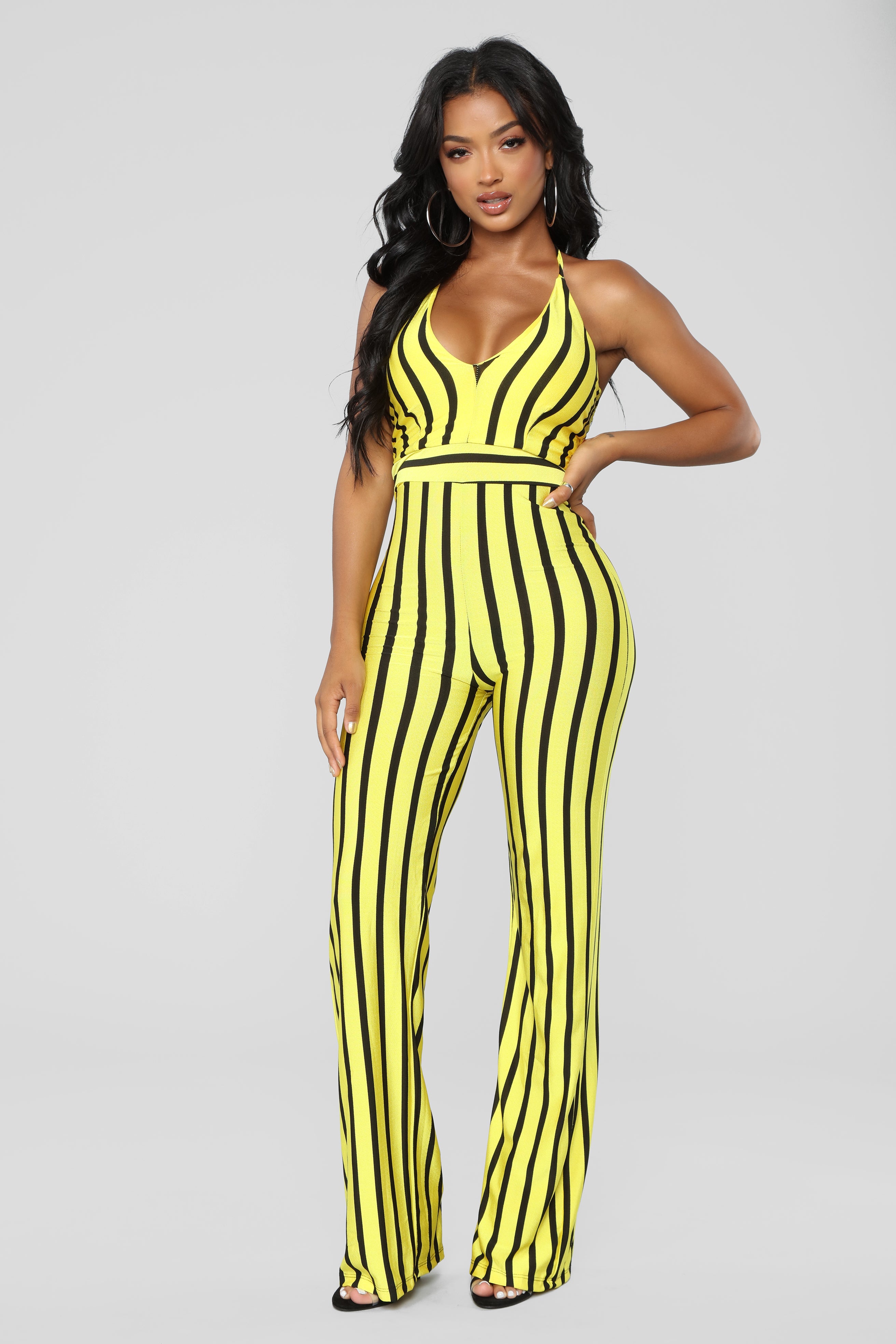 yellow jumpsuit with black stripe