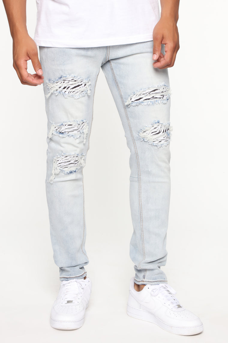 men's rip and repair skinny jeans